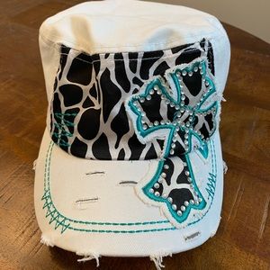 White adjustable hat with zebra print and cross